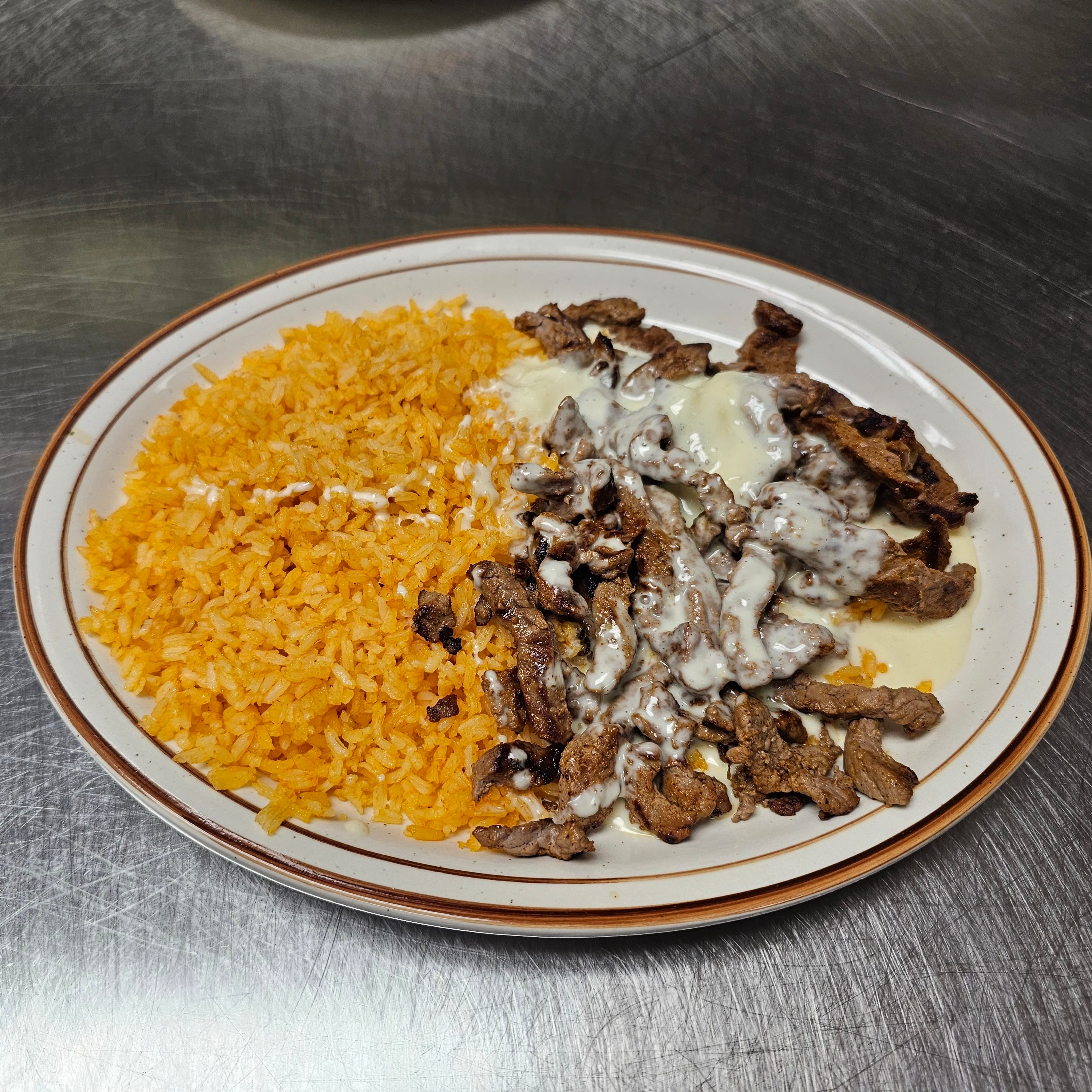Arroz Con Carne.